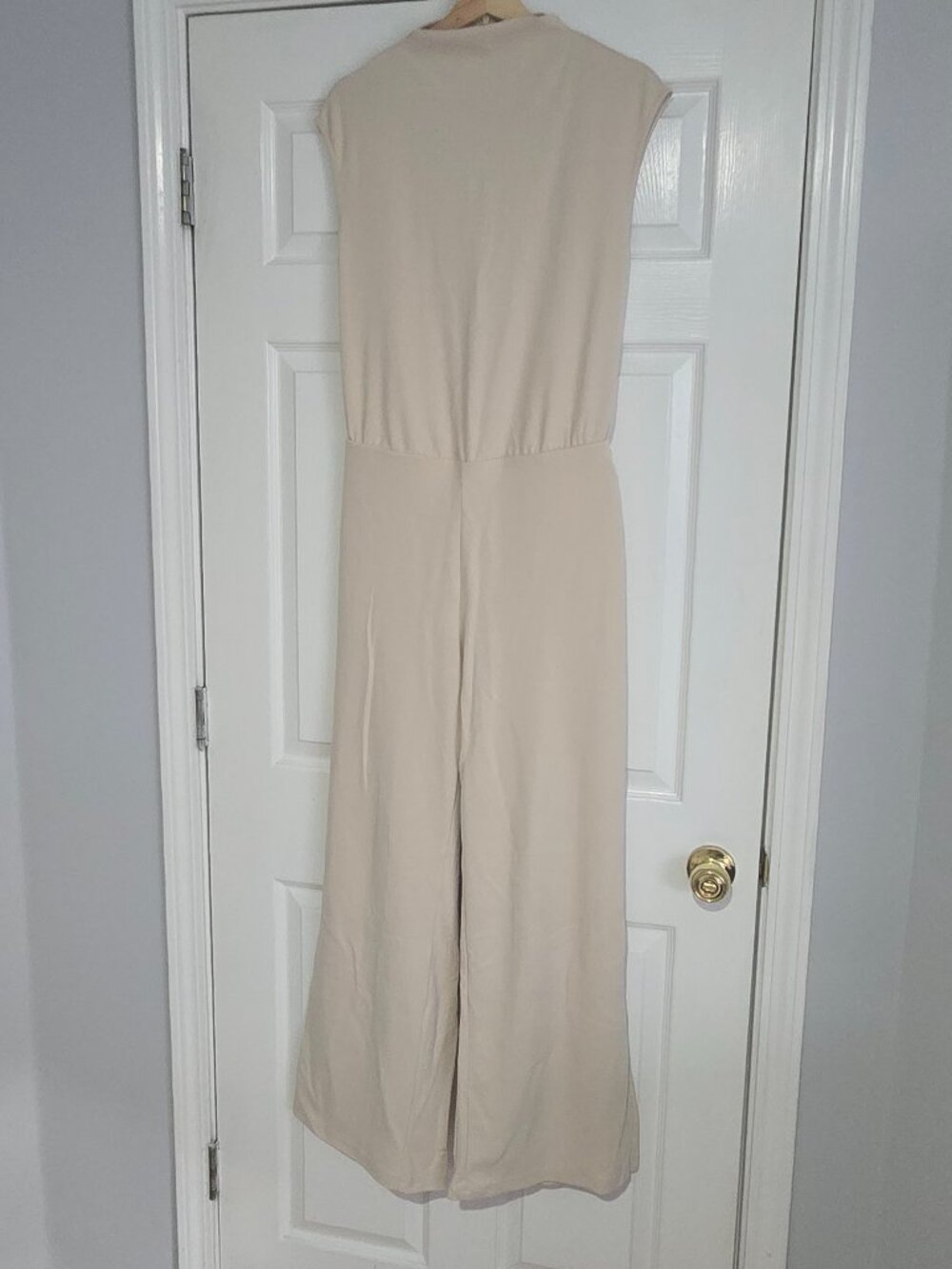 OGL Cream Sleeveless Jumpsuit